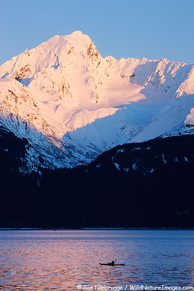 kayak-seward A kayaker enjoying a beautiful afternoon this past Sunday on Resurrection Bay, Seward, Alaska.