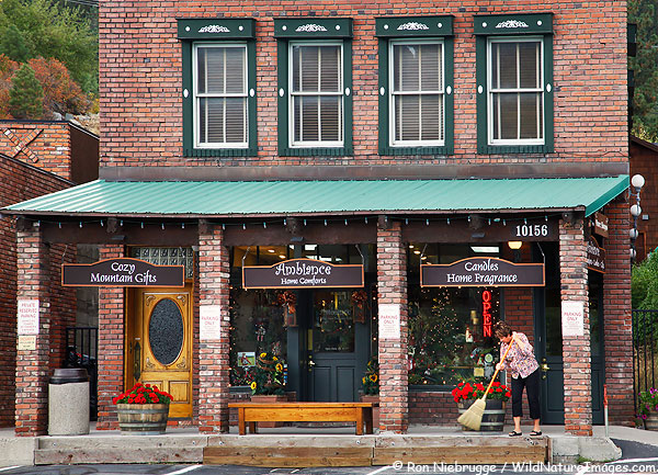 A shop keeper sweeping in front of a store last month in Truckee, California